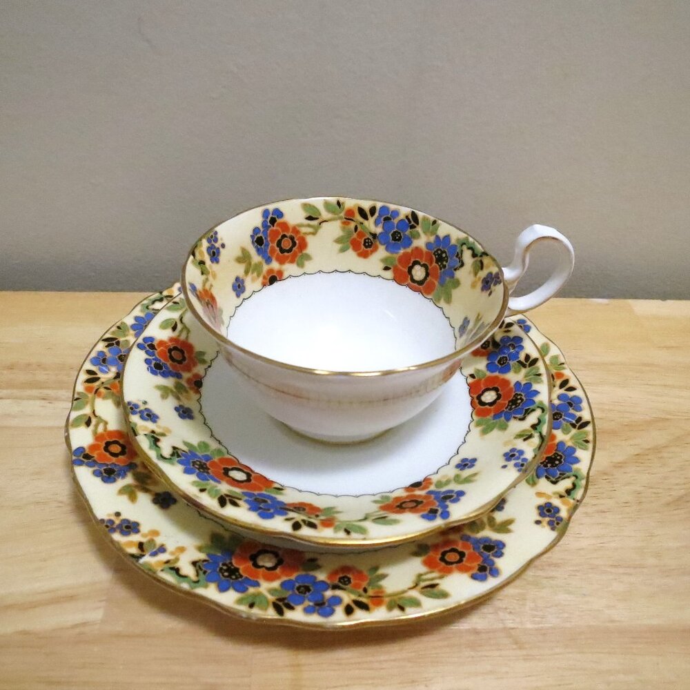 Aynsley Teacup Trio plus one extra Orphan Saucer Bone China A4500 England